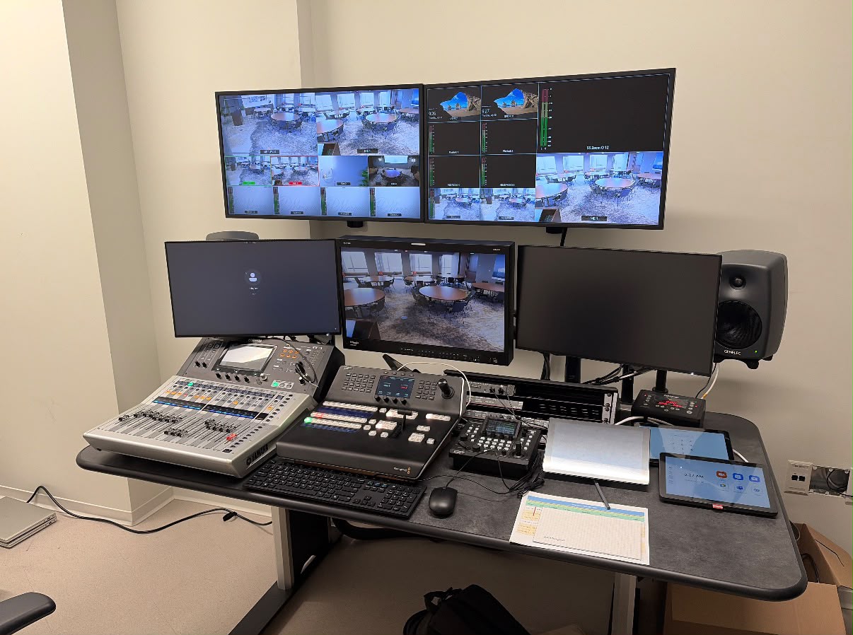 Production control position with multiviewer monitors, an audio console and a video switcher